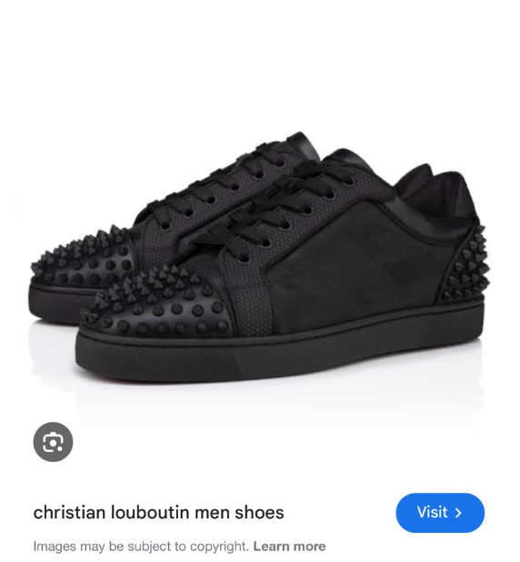 Christian Louboutin Seavaste 2 sneakers in black calf leather with spikes.