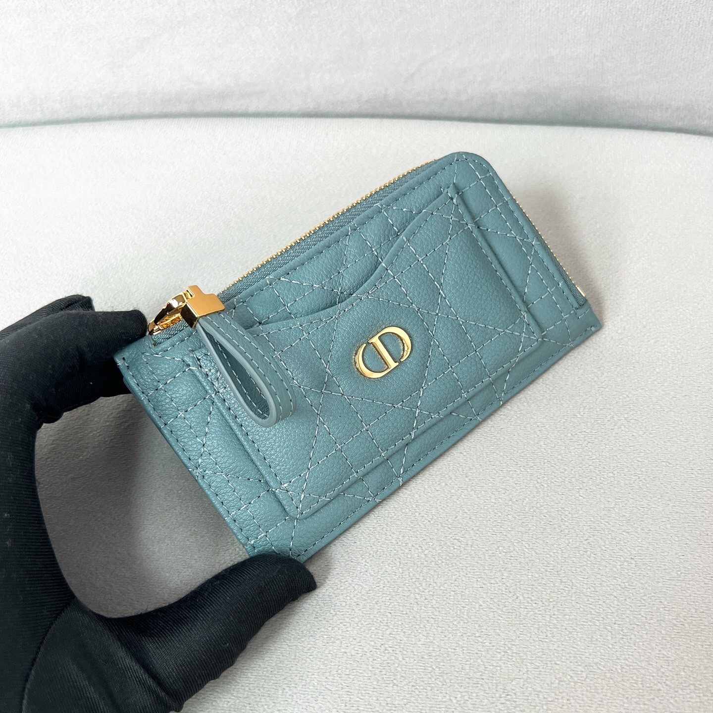 Dior Caro Cosmos Zipped Card Holder in cloud blue supple cannage calfskin.