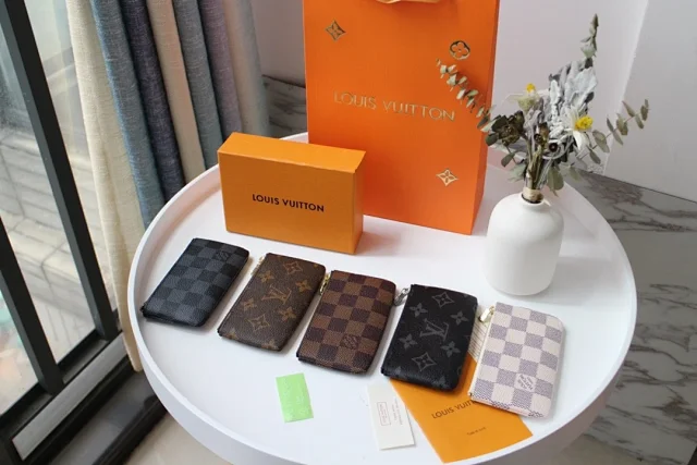 LV key pouches small accessories that can hold coins, cards, and keys