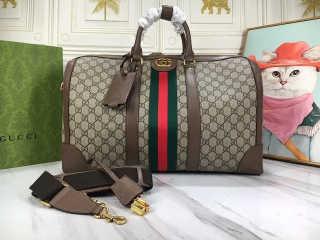 Gucci Savoy duffle bag in beige and dark brown GG Supreme canvas with leather trim and the green and red web stripe