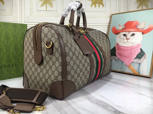 Gucci Savoy duffle bag in beige and dark brown GG Supreme canvas with leather trim and the green and red web stripe