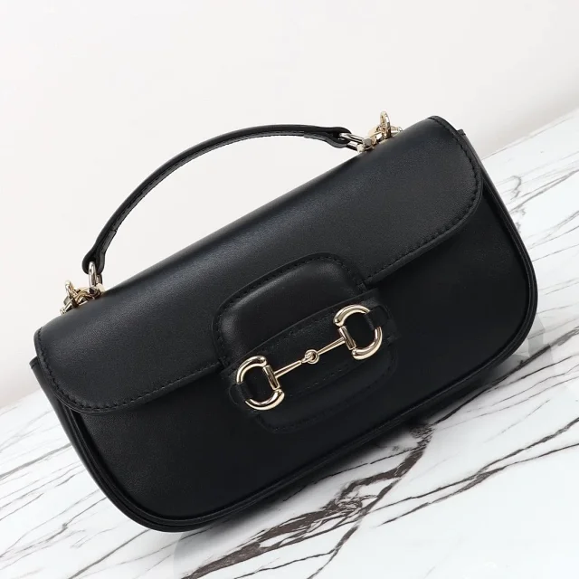 Gucci Horsebit 1955 Soft Small top handle bag in black leather.