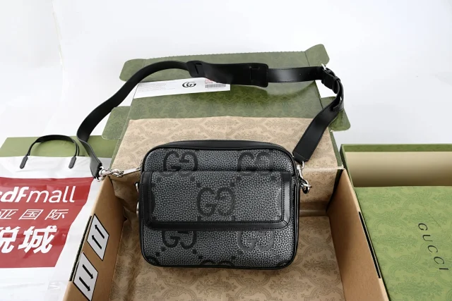 Gucci Small Jumbo GG crossbody bag in grey and black grainy leather