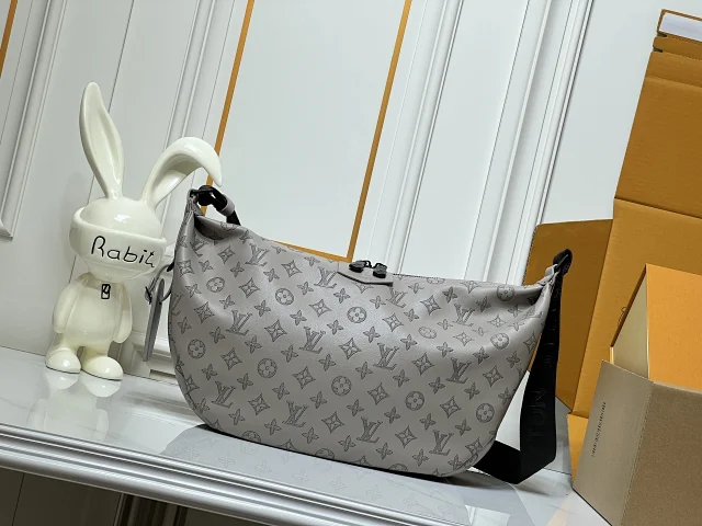 LV Hamac Monogram Shadow Embossed Cow Leather Shoulder Bag in a dark color