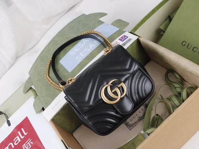 Gucci Mini GG Marmont shoulder bag made from matelassé chevron leather black