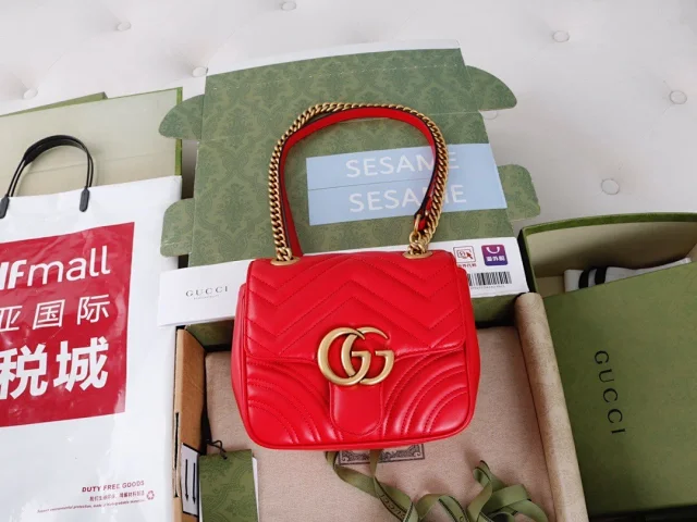 Gucci GG Marmont matelassé mini bag in red leather shoulder bag