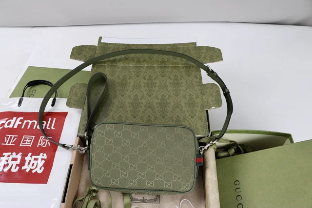 Gucci GG canvas small crossbody bag in forest green with leather trim and a green and red Web detail