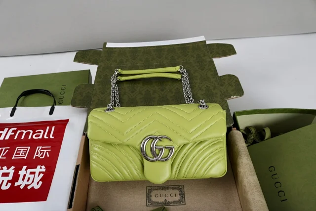 Gucci GG Marmont medium shoulder bag in bright green matelassé leather with silver-tone hardware