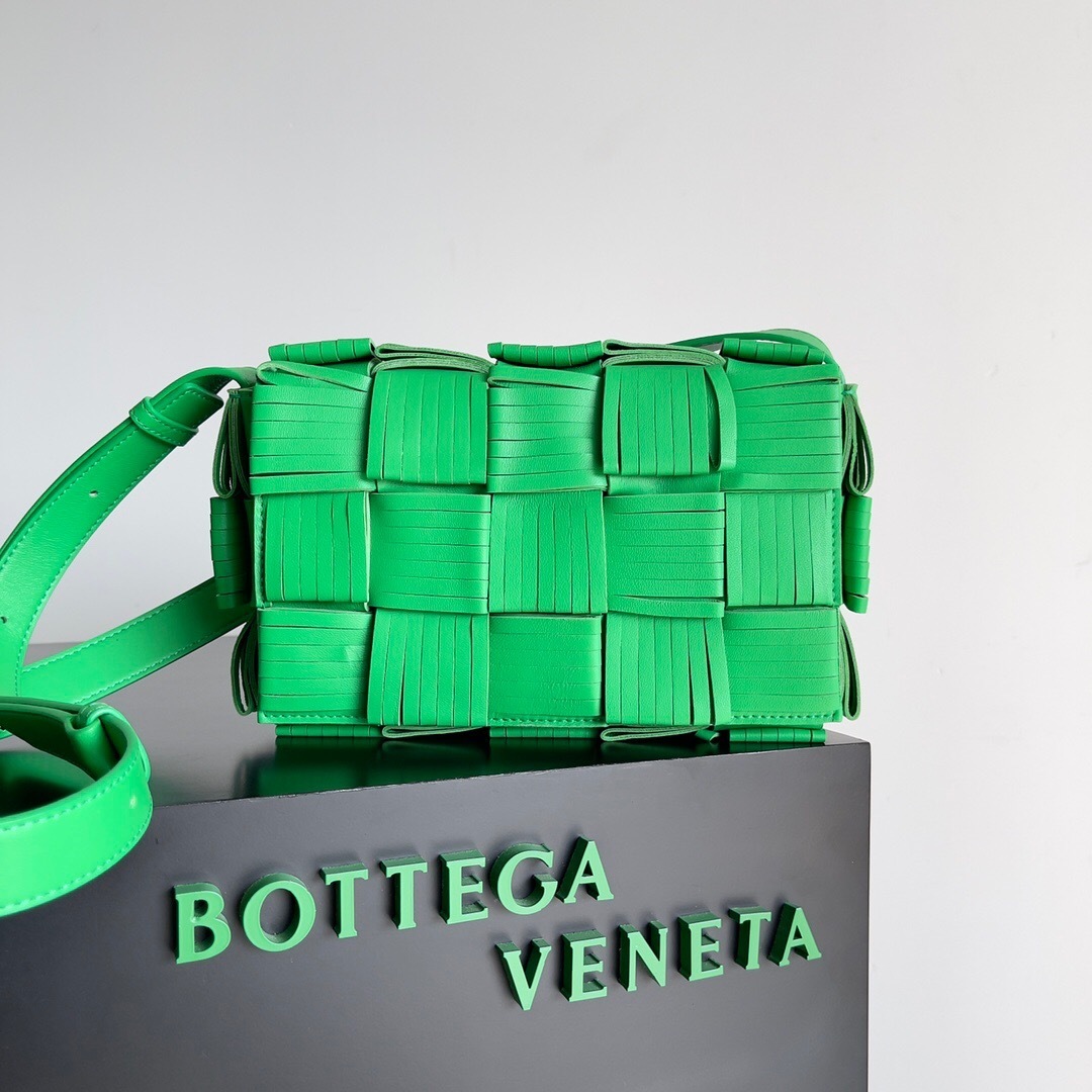 Bottega Veneta Maxi Intrecciato Fringed Cassette crossbody bag in green nappa leather