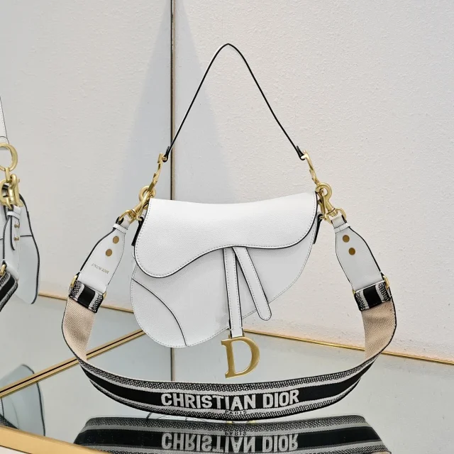 Christian Dior Saddle bag in white leather with a wide, embroidered shoulder strap