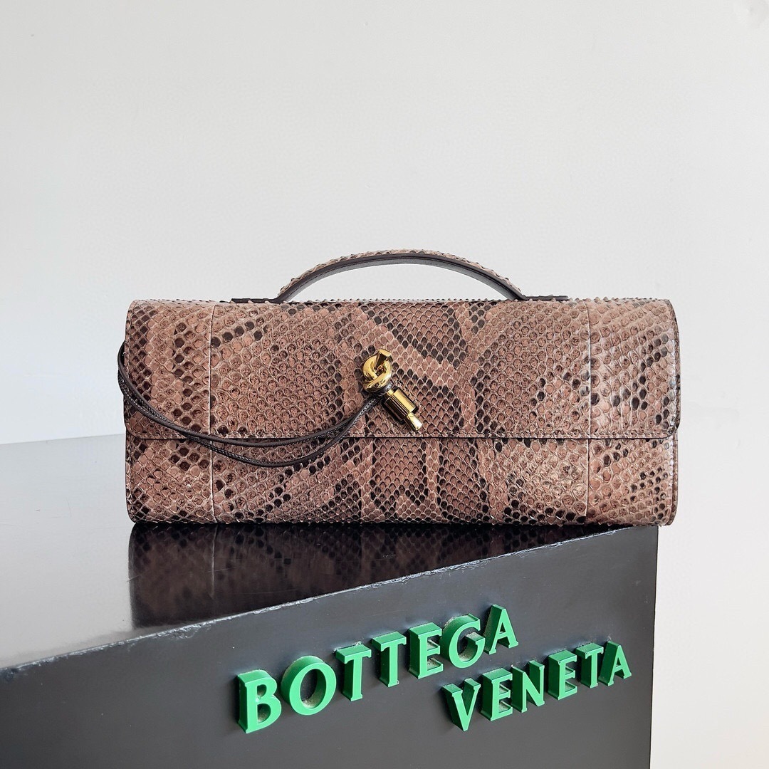 Bottega Veneta Andiamo long clutch in python leather with a metallic knot closure