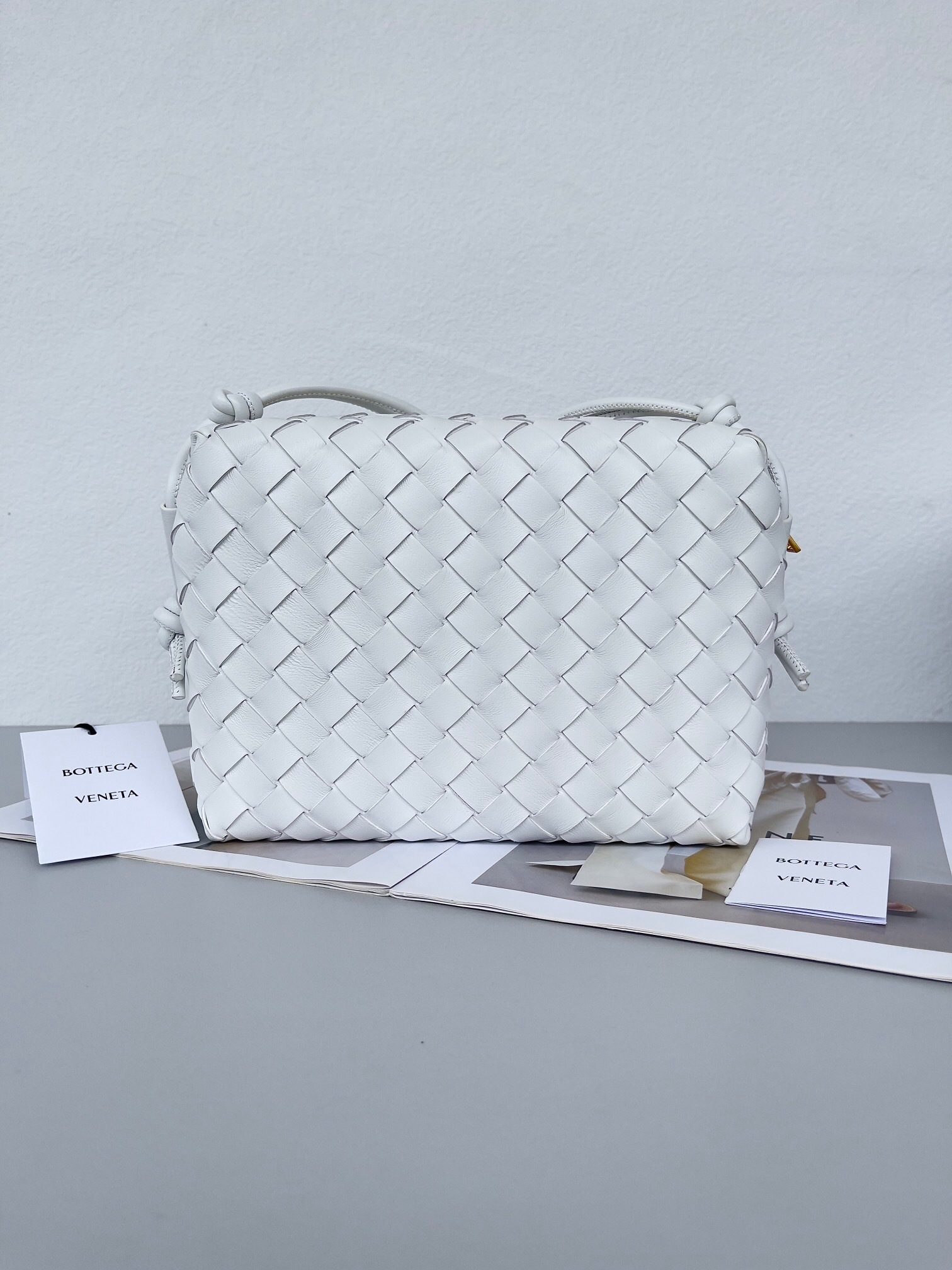Bottega Veneta Small Loop Camera Bag in white intrecciato leather