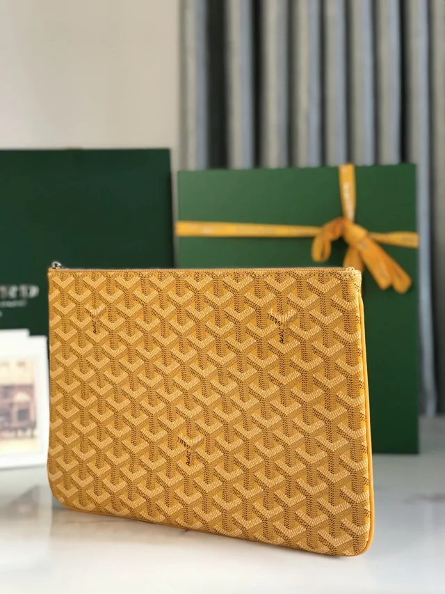 Goyard Senat MM Pouch in yellow Goyardine coated canvas.