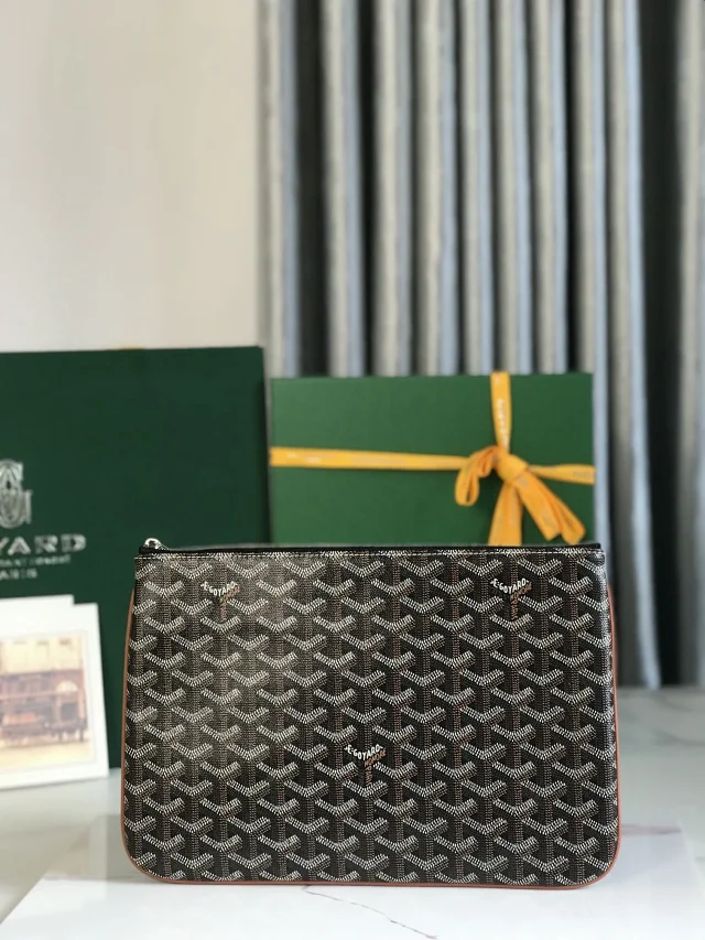 Goyard Senat clutch pouch in Goyardine canvas with the chevron "Y" motif