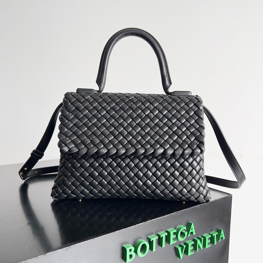 Bottega Veneta Patti Top Handle Bag crafted from lambskin leather in the signature Intreccio weave pattern