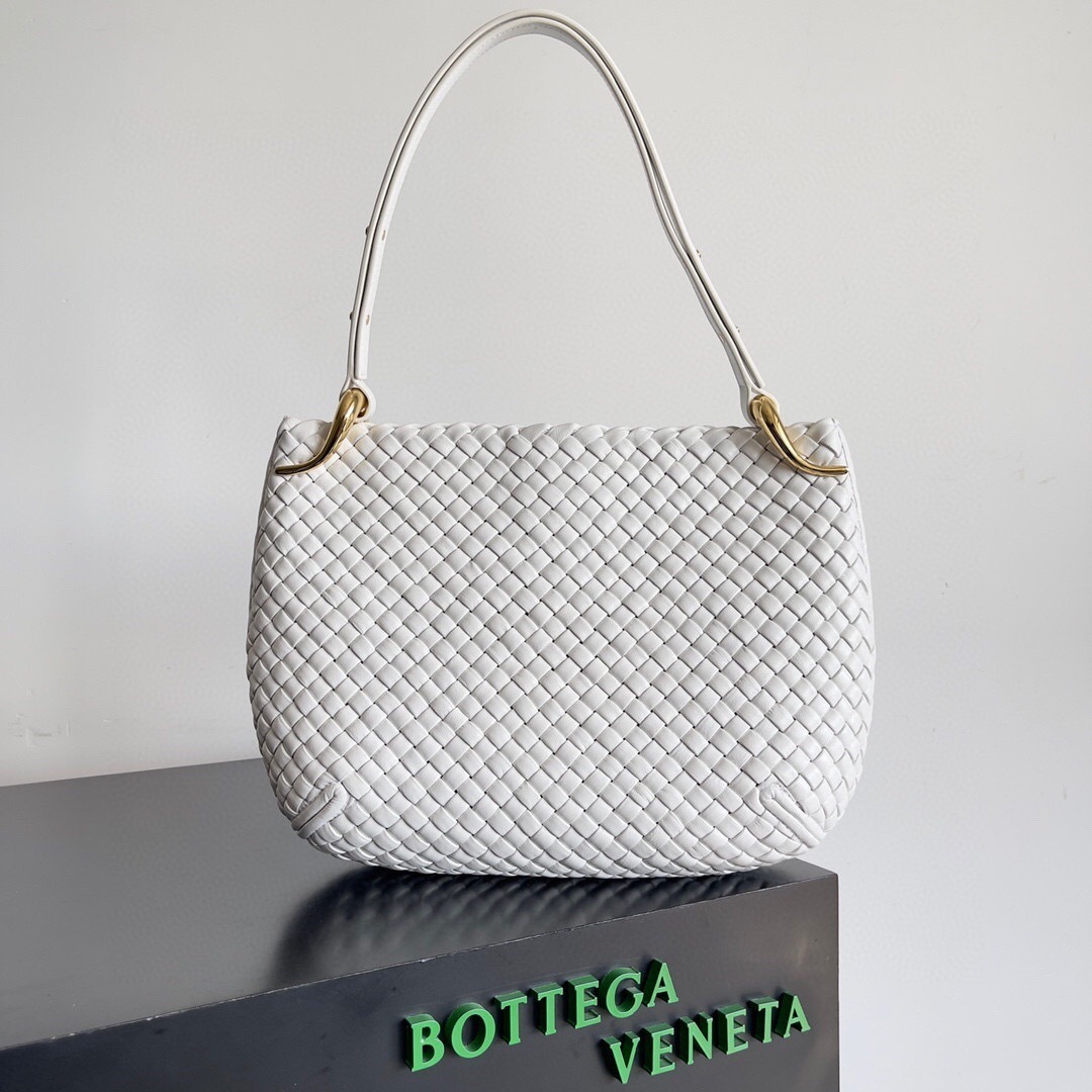 Bottega Veneta Clicker bag white crafted from woven leather with brass hardware.