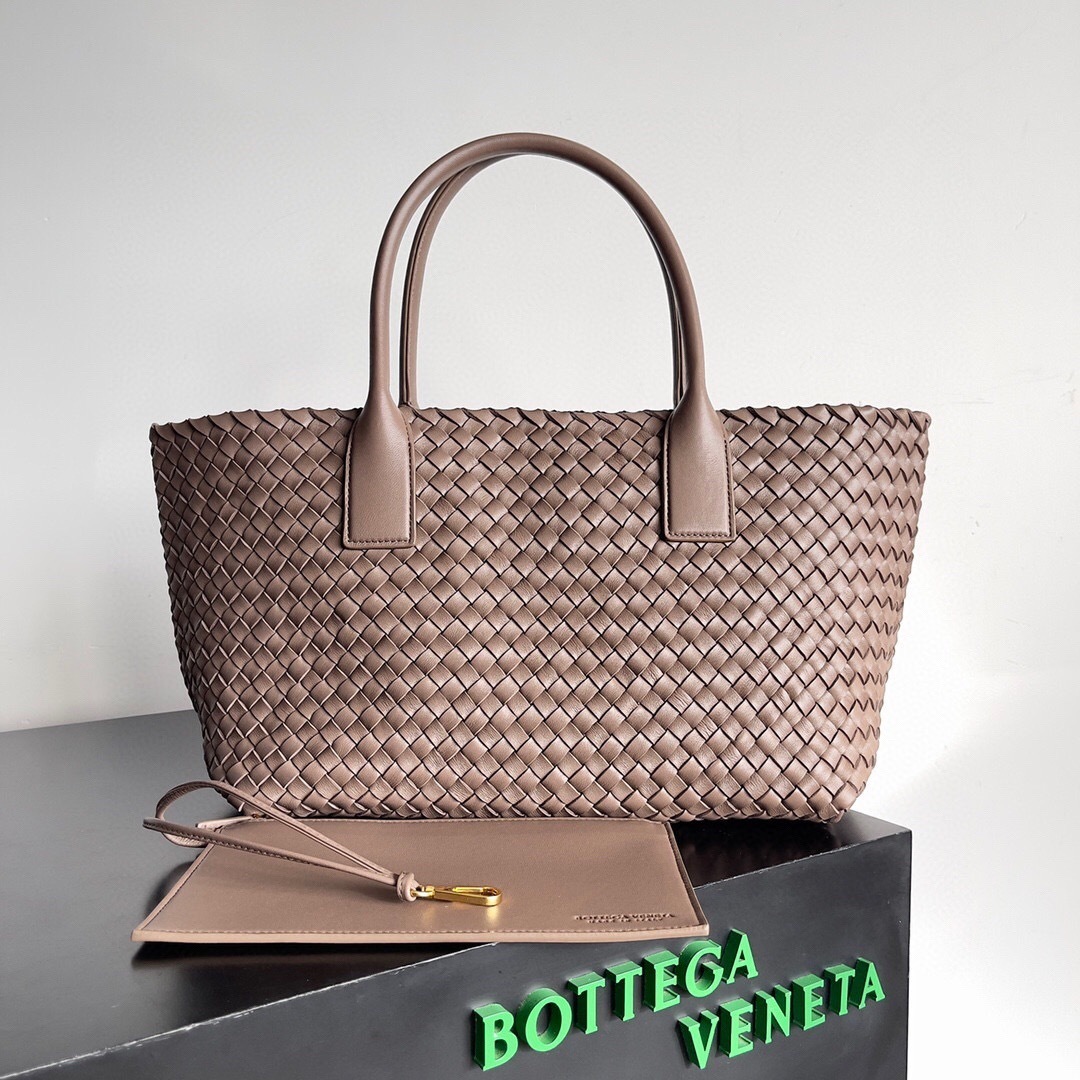 Bottega Veneta Cabat tote bag, featuring the brand's signature intrecciato-woven leather