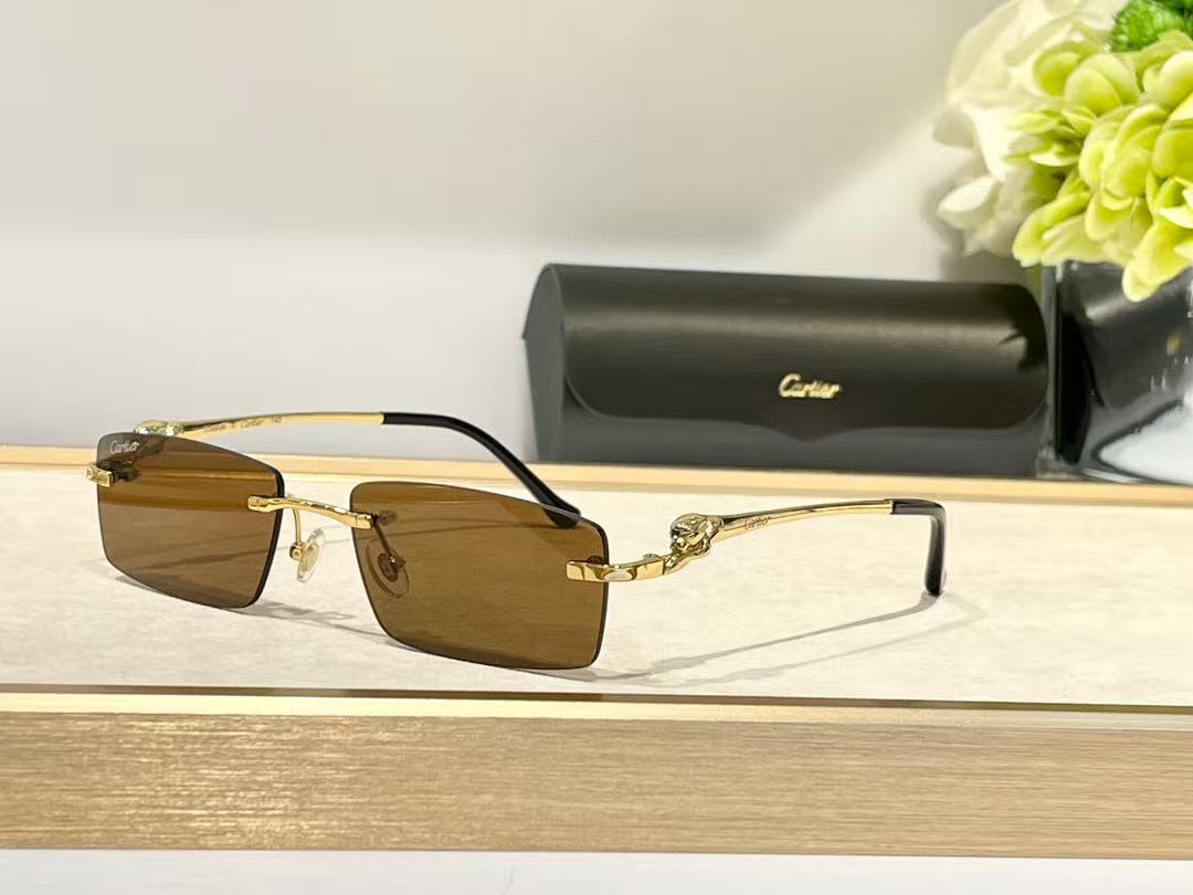Cartier Panthère CT0430S sunglasses with gold-finish metal frames and brown lenses