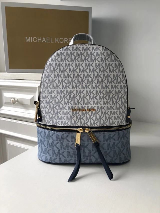 Michael Kors Rhea Medium Colorblock Signature Logo Backpack in coated canvas bag