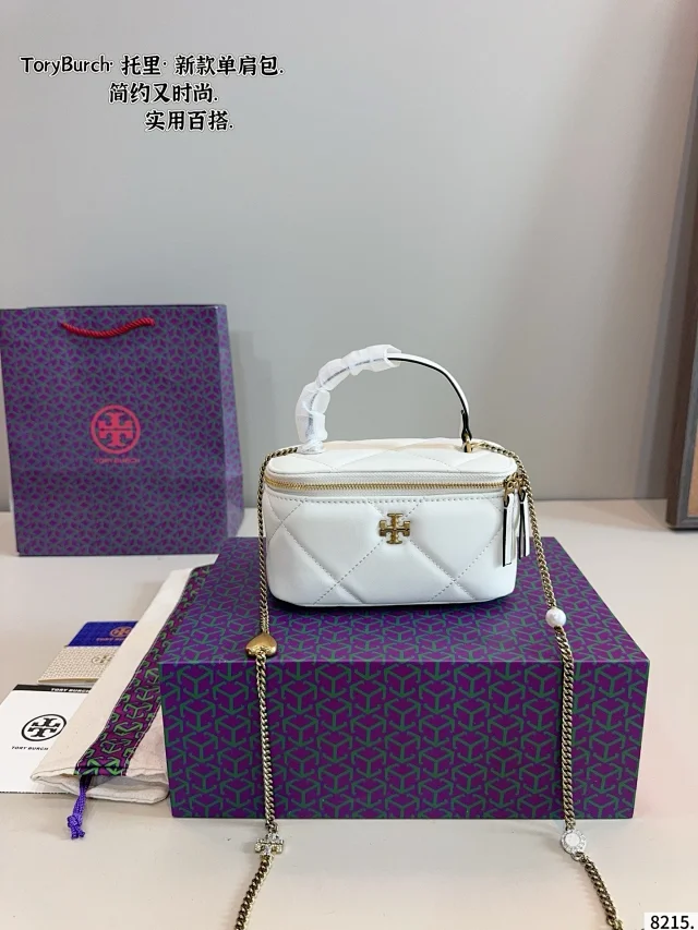 Tory Burch Kira Diamond Quilt Vanity Case in warm white leather