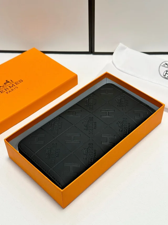 Hermes wallet Zippy Clémence model, with an embossed logo pattern black