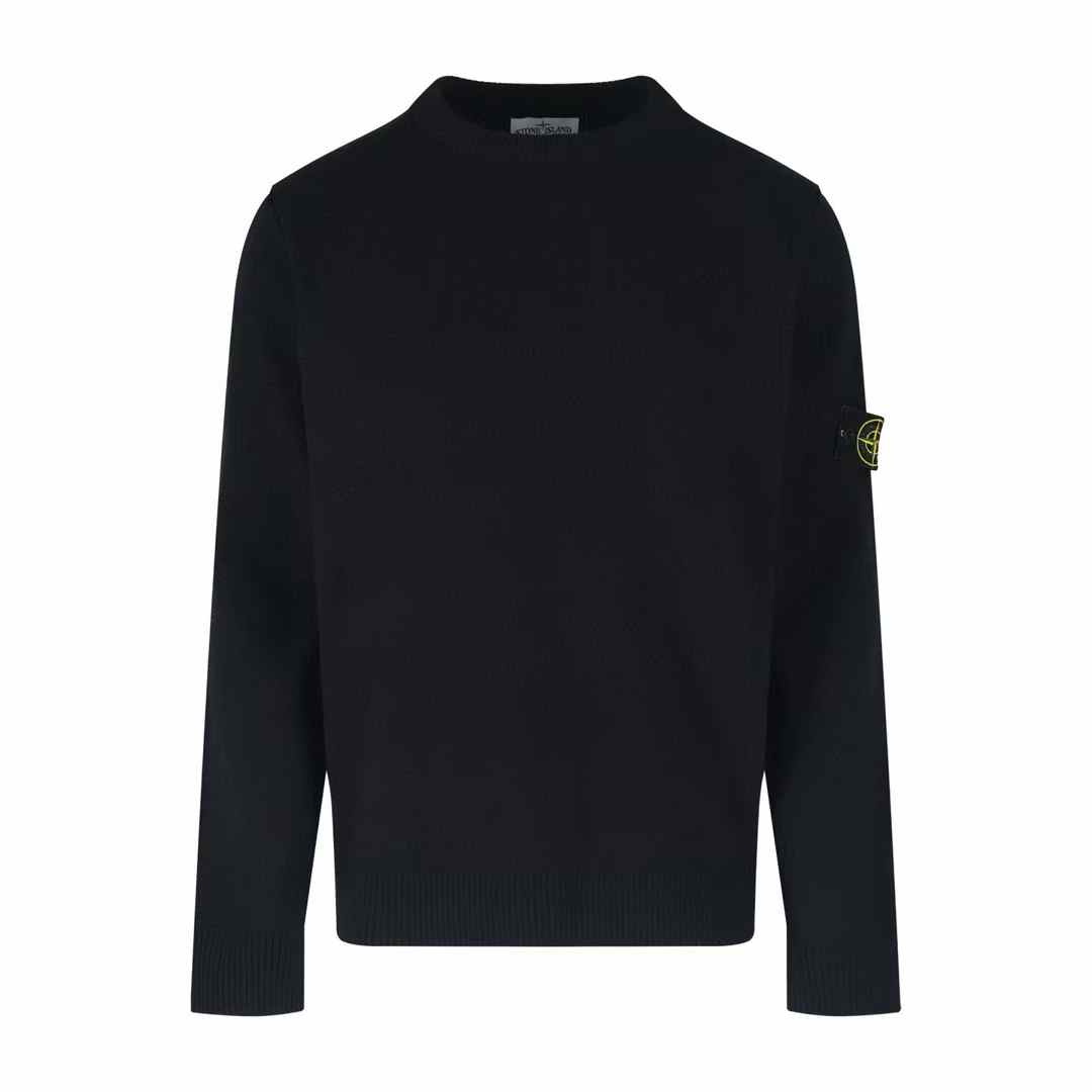 Stone Island sweater with the brand's iconic detachable compass rose badge on the sleeve