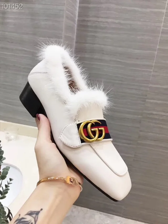 Gucci GG Marmont Leather Loafer with fur trim and a block heel