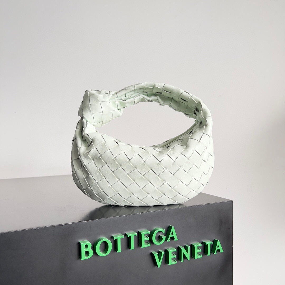 Bottega Veneta Mini Jodie bag in a light green intrecciato woven leather tote