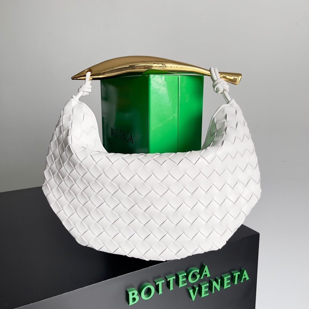 Bottega Veneta Sardine Top Handle bag in white woven leather with a gold-tone metal handle.