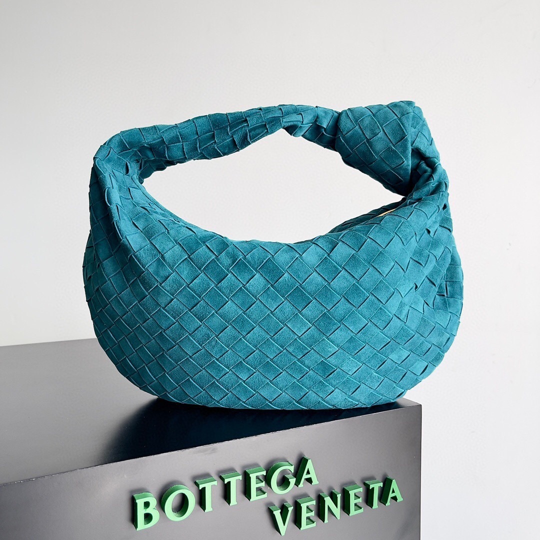 Bottega Veneta Teen Jodie bag in teal suede with an intrecciato weave tote bag