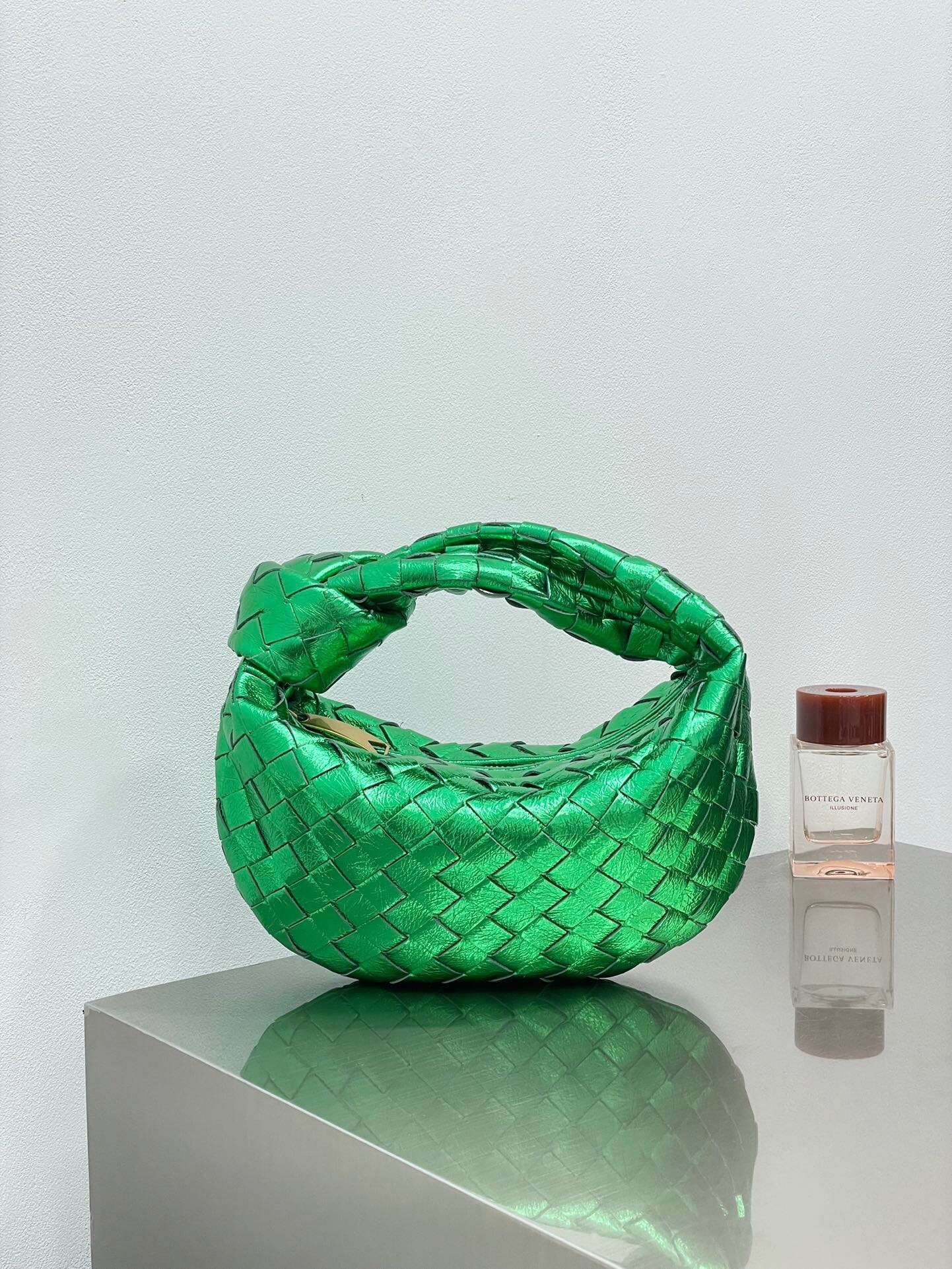 Bottega Veneta Mini Jodie bag in green woven leather tote bag