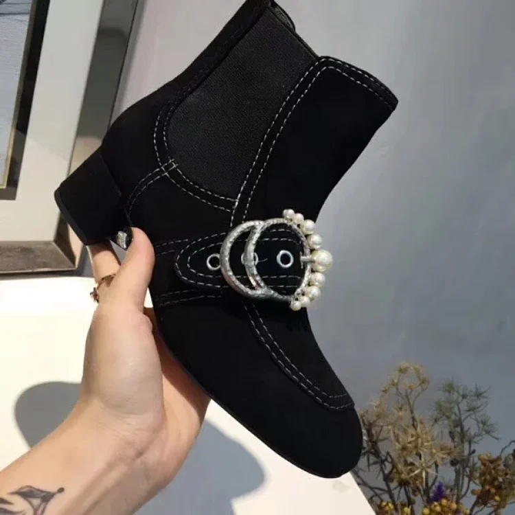 Miu Miu Pearl Buckle Ankle Boots in black suede