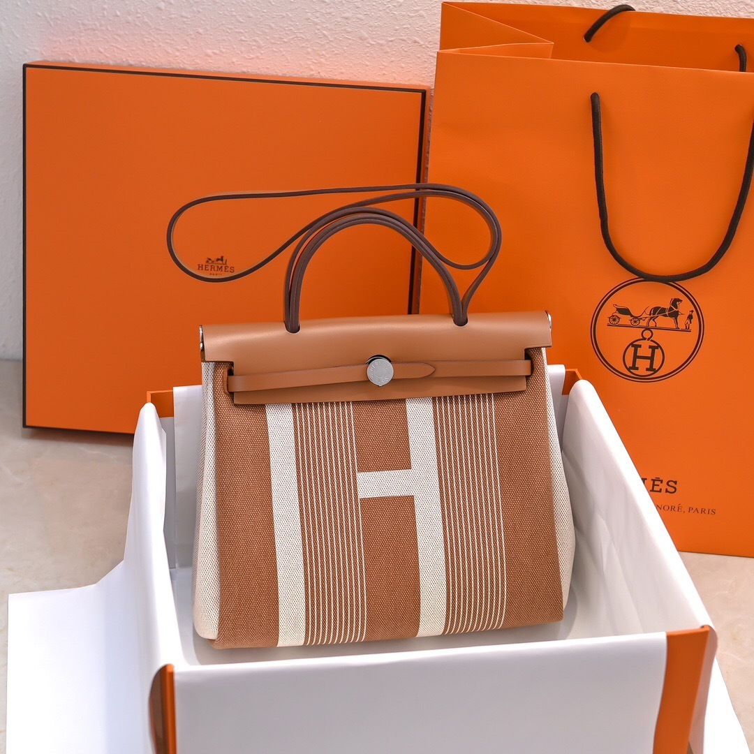 Hermes Herbag Zip 31 with Toile H Vibration canvas in Fauve, Ecru, and Beige with Vache Hunter leathertop handle