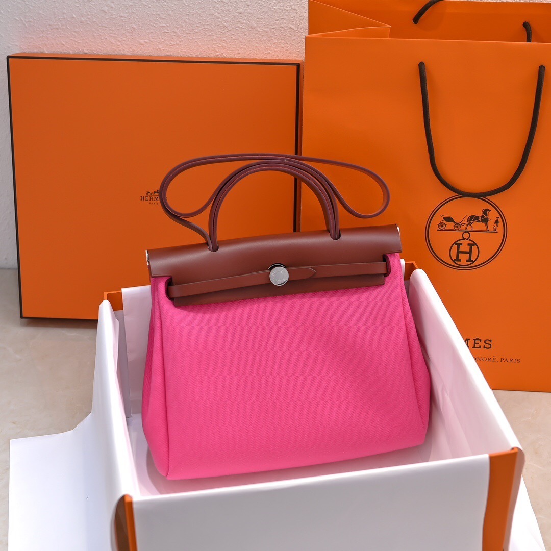 Hermes Herbag Zip 31 in pink toile canvas with brown leather trim top handle