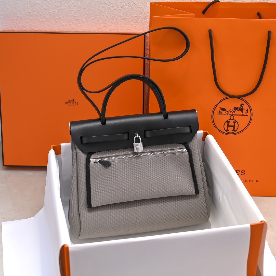 Hermes Herbag Zip 31 bag, which is a canvas and leather Kelly tote bag.