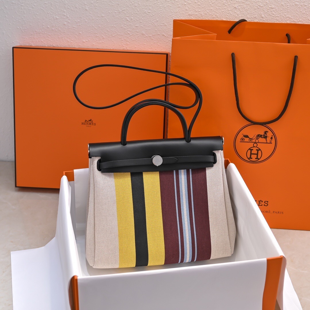 Hermes Herbag Zip 31 PM in canvas and leather with a striped pattern