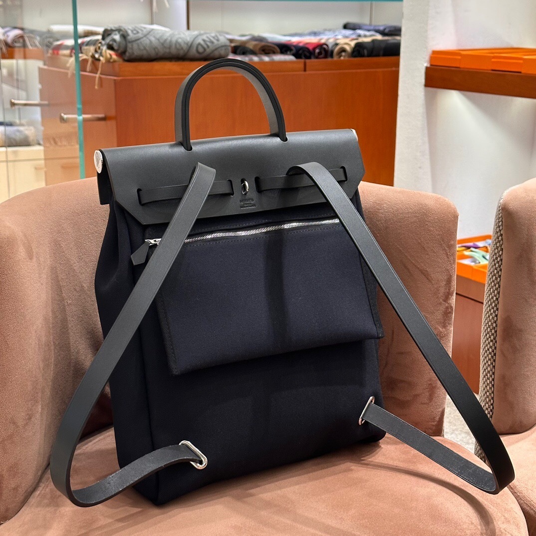 Hermes Herbag Backpack made of canvas and Vache Hunter leather.