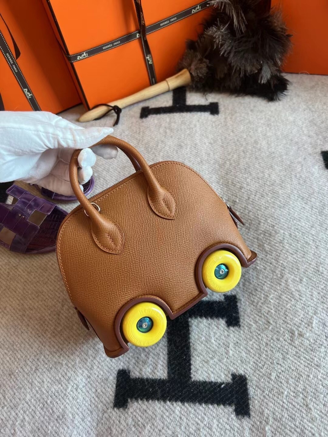 Hermes Mini Bolide On Wheels bag in Gold epsom leather with Jaune Citron rubber wheels and palladium hardware tote bag