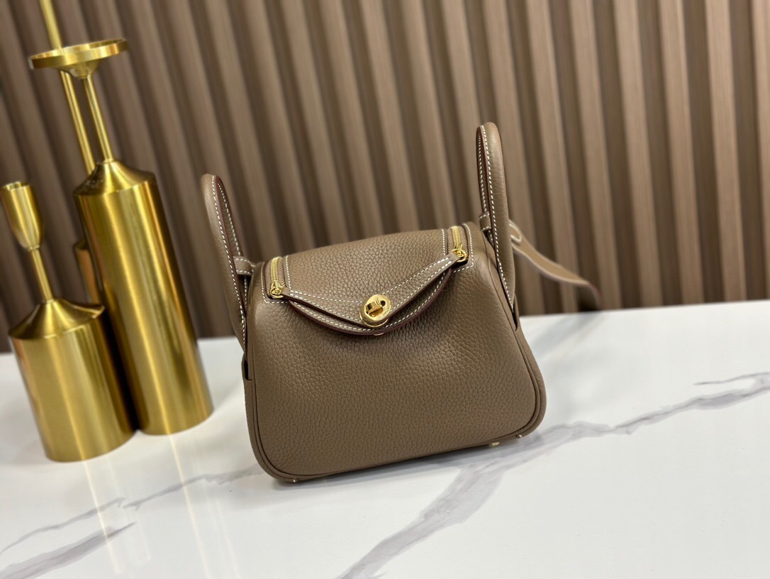 Hermes Mini Lindy 20 bag in Etoupe Taurillon Clemence leather with gold hardware tote bag