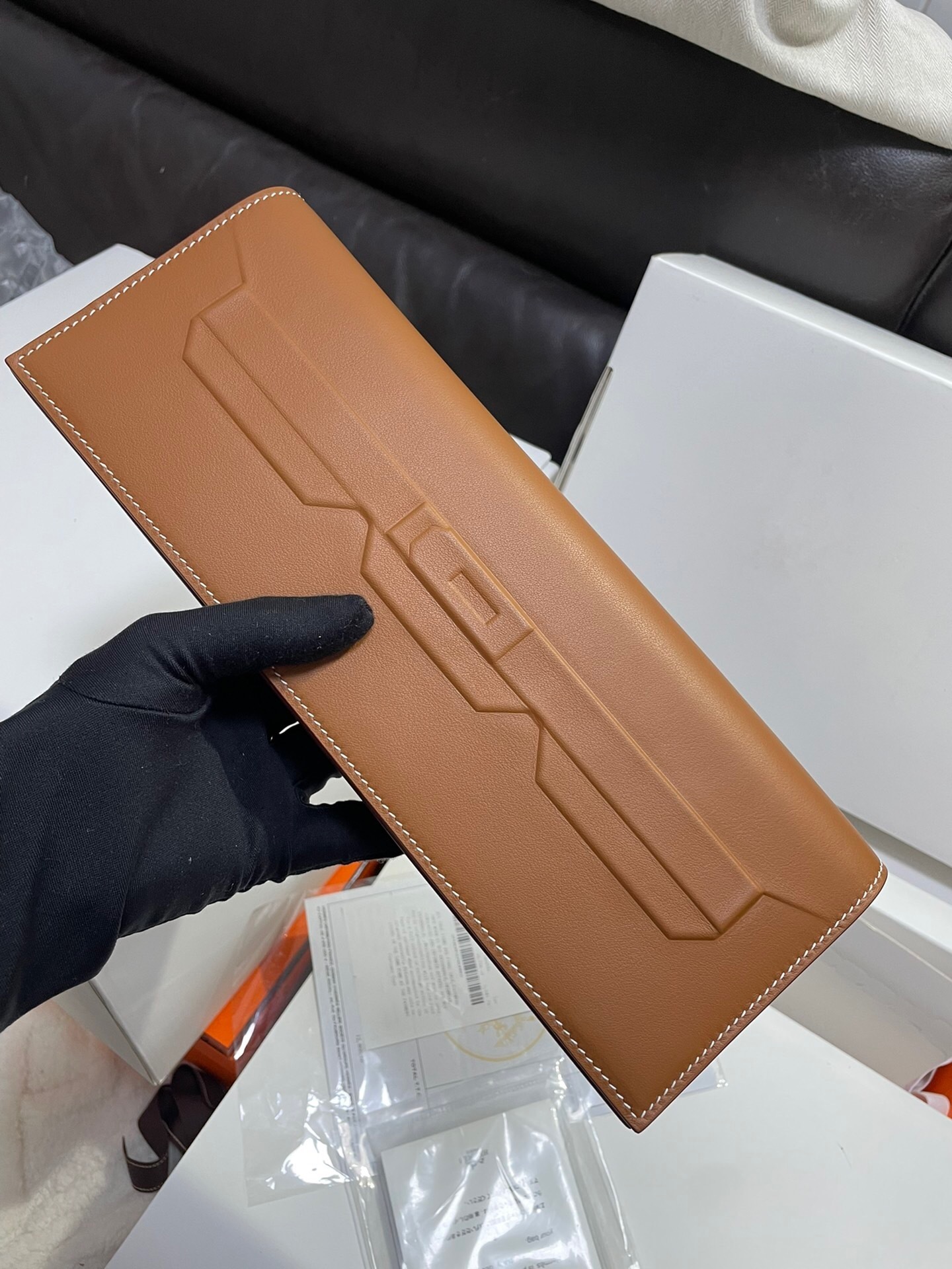 Hermes Birkin Pochette Shadow clutch bag in gold swift leather