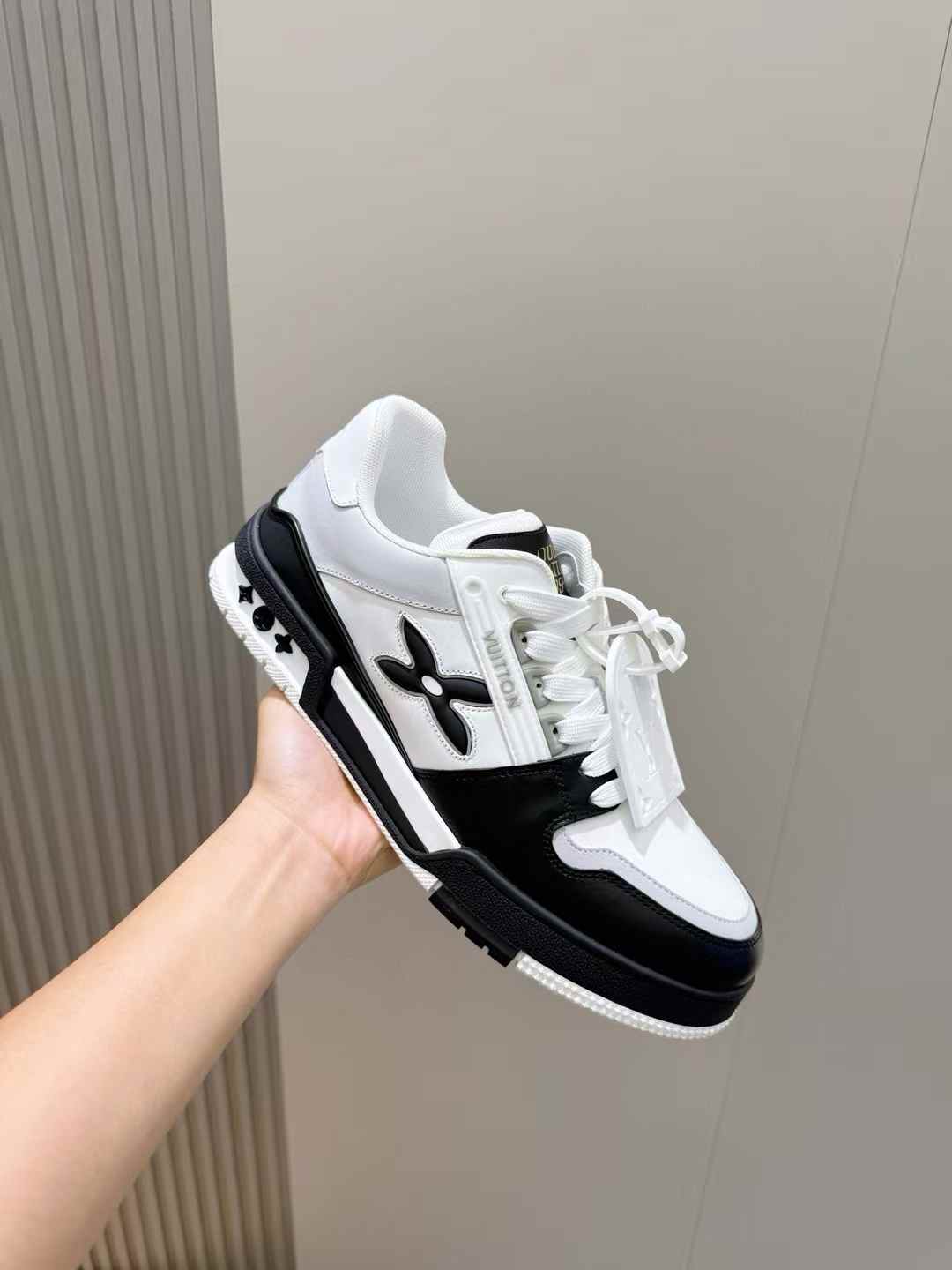 LV Trainer sneaker in a black and white colorway