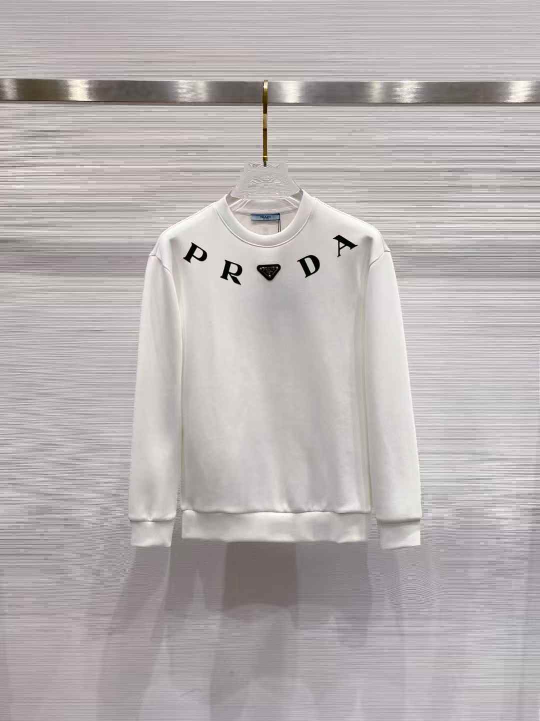 Prada white crew-neck pullover with a branded letter print sweater