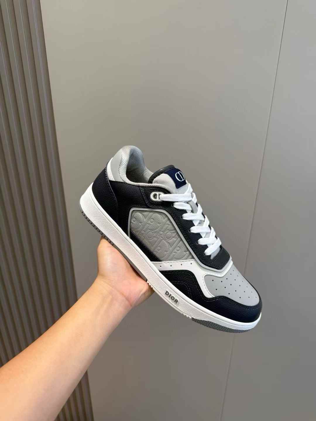 Dior B27 low-top sneaker in gray and white smooth calfskin with Dior Oblique jacquard panels