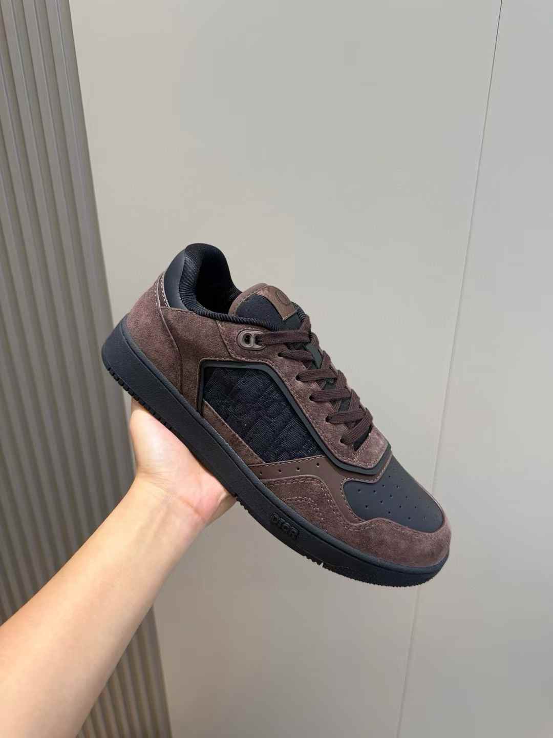 Dior B27 Uptown low-top sneaker in deep brown suede with black smooth calfskin and Dior Oblique jacquard panels