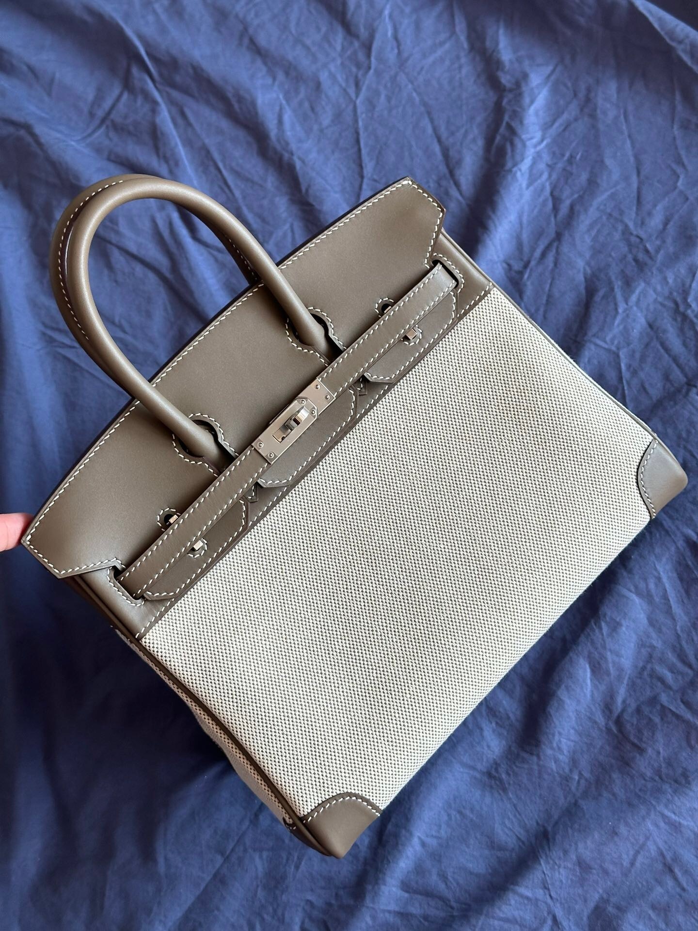 Hermes Birkin 25 bag in Toile H canvas and Swift leather in the color Etoupe with palladium hardware