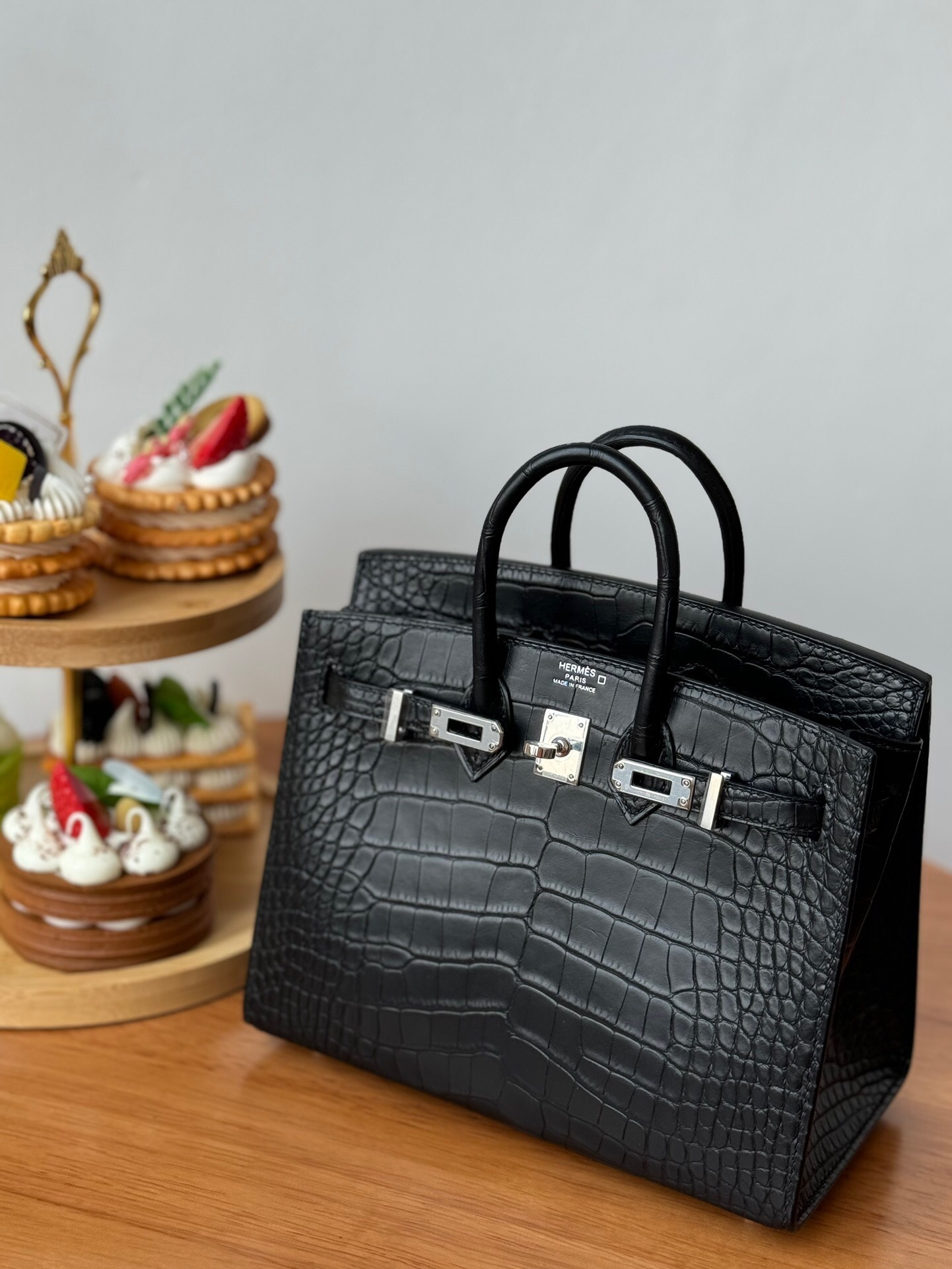 Hermes Birkin 25 bag in black alligator or crocodile leather with silver hardware