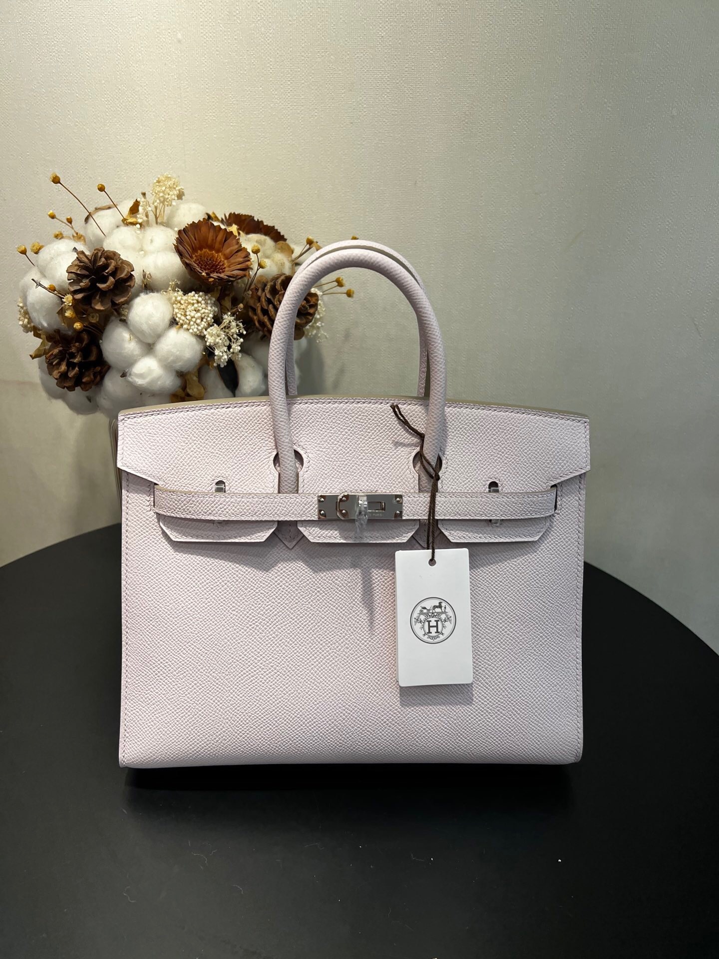 Hermes Birkin handbag in a light color, possibly Gris Pale