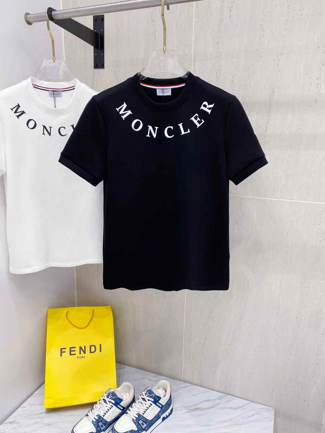 Moncler t-shirt with a white logo print across the chest
