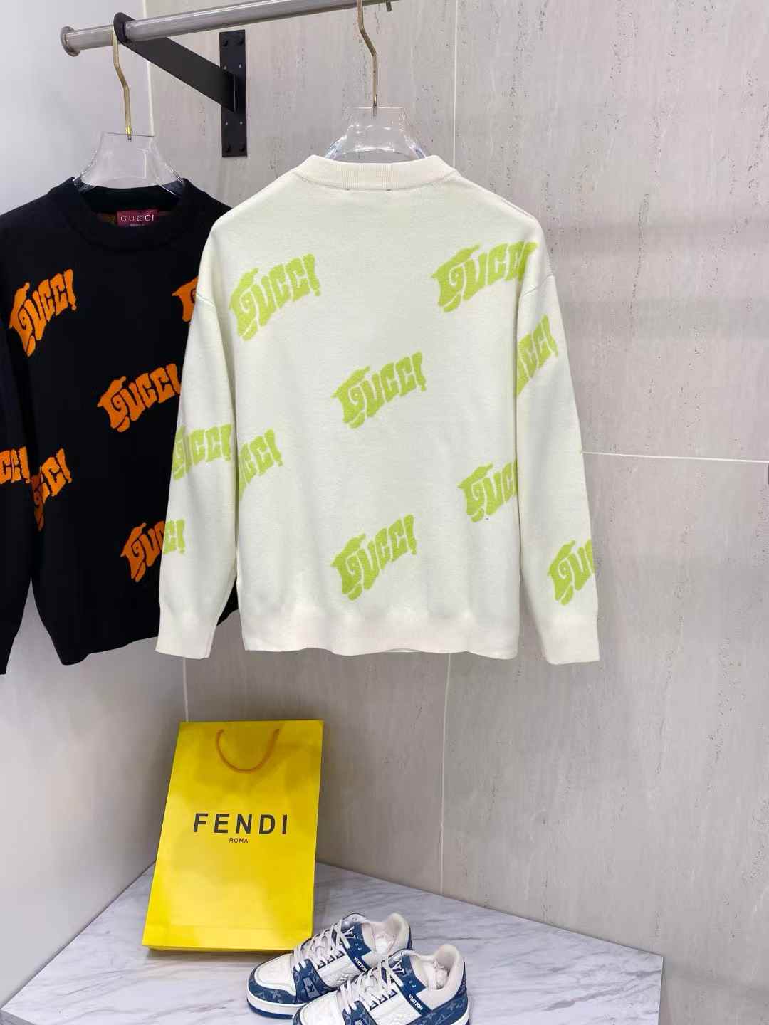 Gucci embroidered cotton jersey T-shirt in white with a lime green allover logo