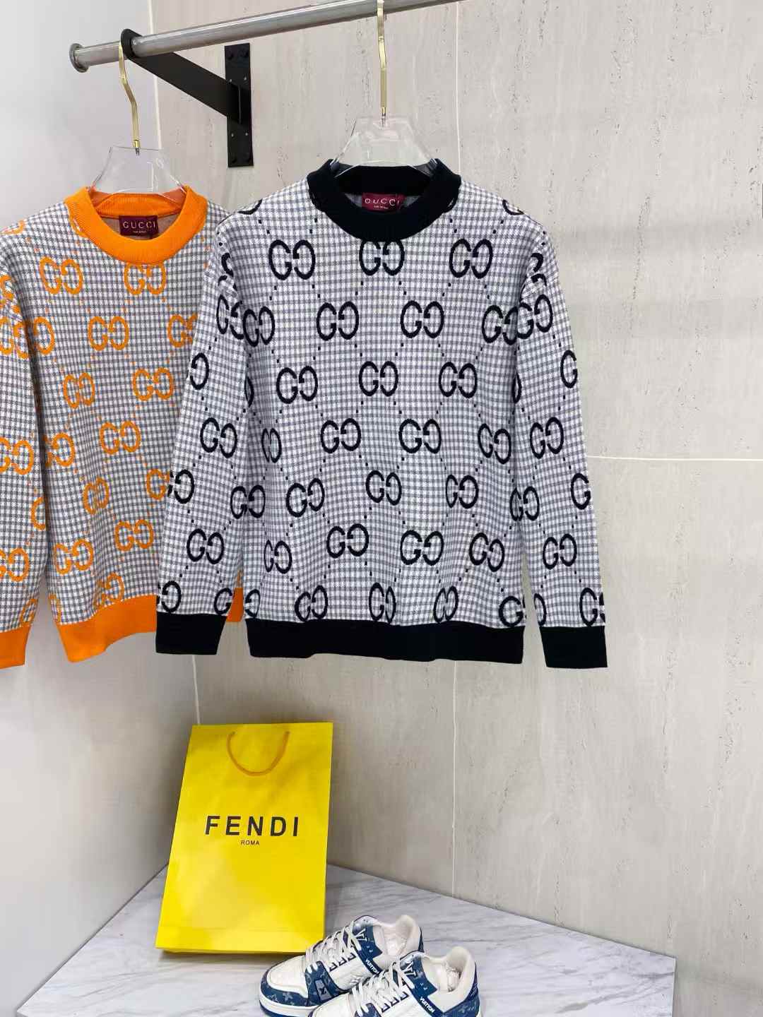 Gucci sweater with the GG logo pattern